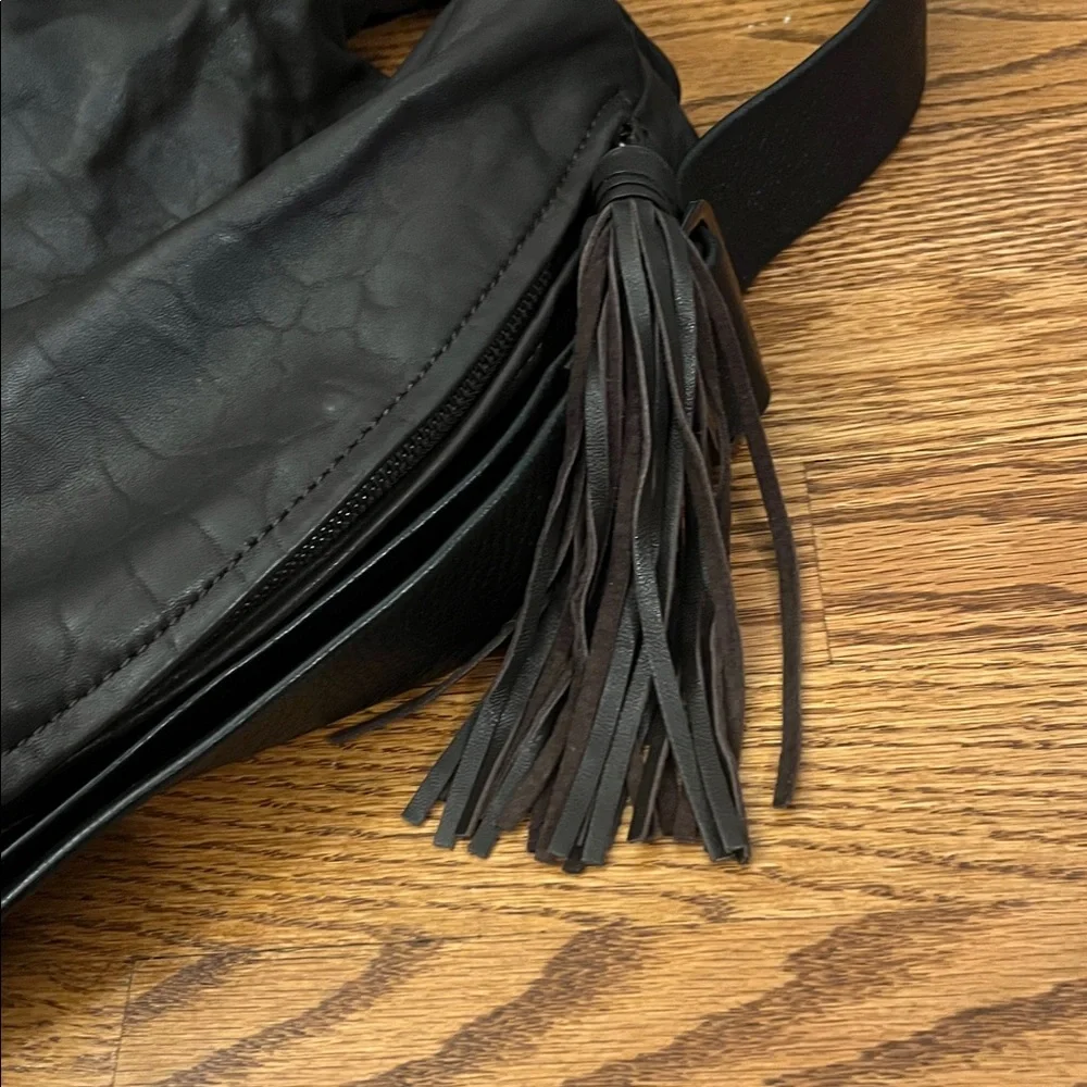 DanAzan slouchy one shoulder bag in brown leather with black adjustable strap